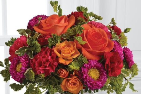 This charming mix of fresh blooms in ripe, fruity shades of raspberry, peach and cherry is a tempting pick-me-up for any day of the week. Send one to a favorite friend to brighten up their day.